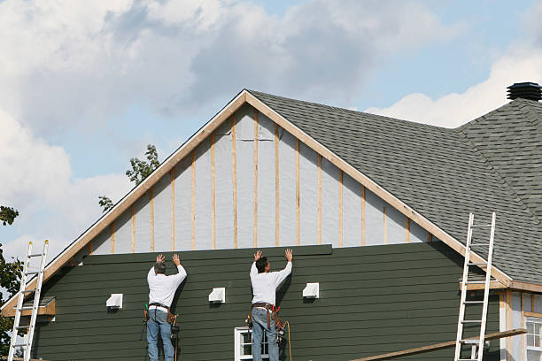 Professional Siding technician working in Freeman, VA